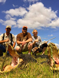 Husband and wife hunt a monster with Alligator Hunting Florida.